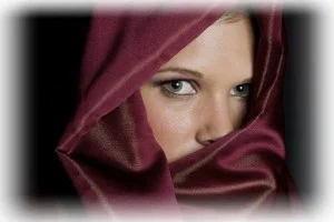 Woman wearing burgundy hijab representing ministry to Muslim women and American women married to Muslims